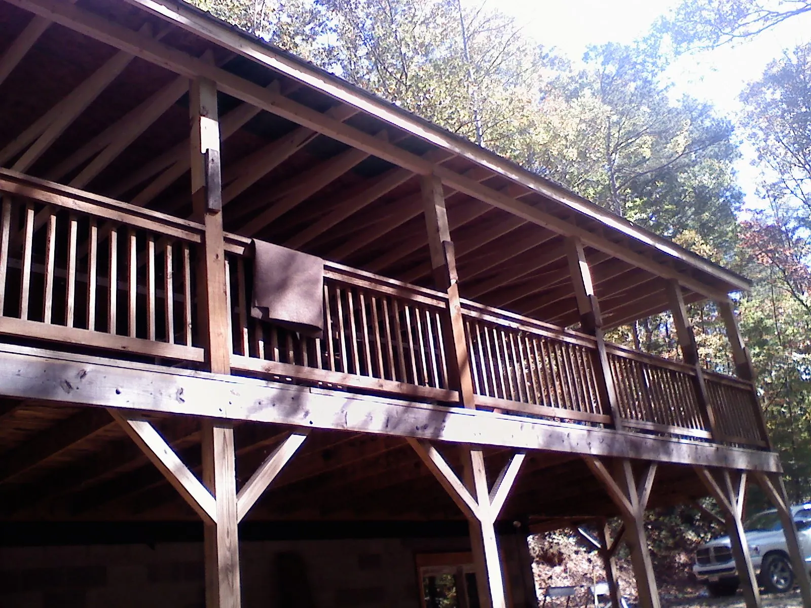 Timber framing under a new elevated porch and deck — Roof Leak Repair in Ely by Roofing Brothers